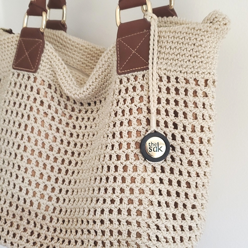 The Sak crochet shoulder bag cream color